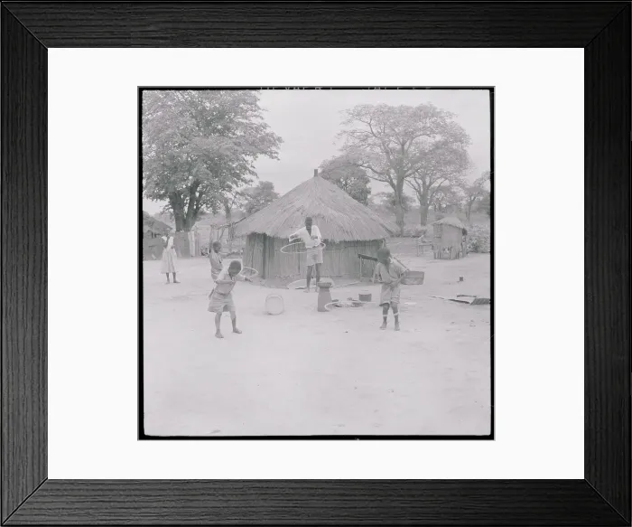 Framed Print : African Children Enjoying Hula Hoops Framed Print : African Children Enjoying Hula Hoops