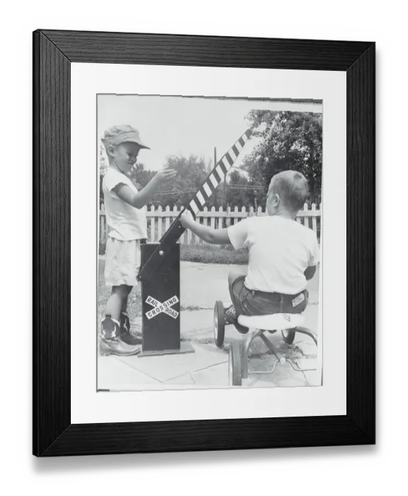 Framed Print : Boys with Makeshift Railroad Crossing Model Framed Print : Boys with Makeshift Railroad Crossing Model