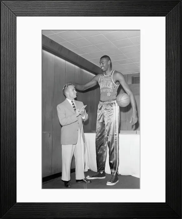 Framed Print : Wilt Chamberlain Talking with Short Reporter Framed Print : Wilt Chamberlain Talking with Short Reporter