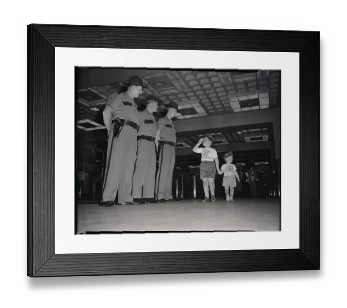 Framed Print : Brothers Walk By And One Salutes Officer Framed Print : Brothers Walk By And One Salutes Officer