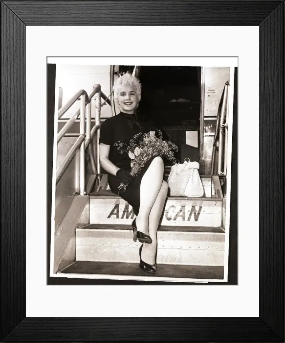 Framed Print : Stella Stevens Posing for Photo
