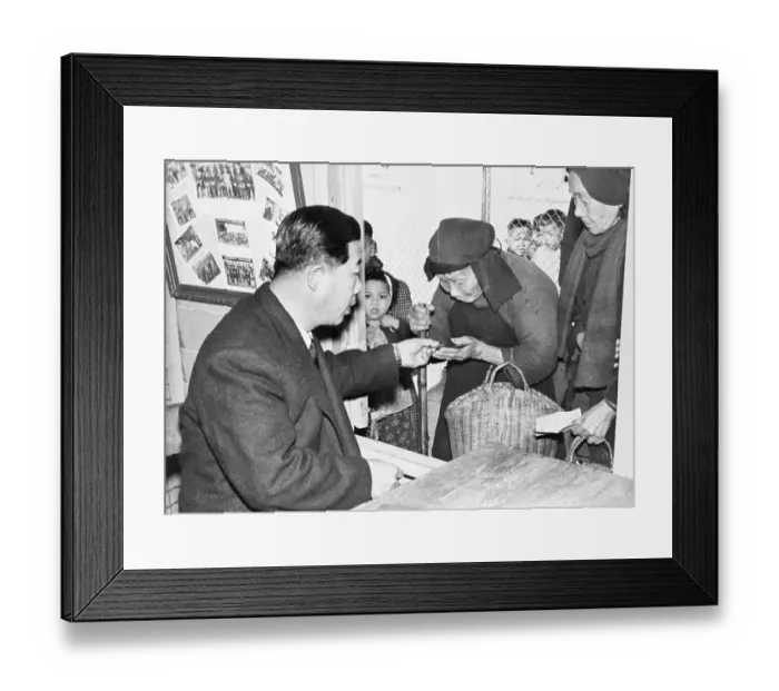 Framed Print : Elderly Woman At Counter Receiving Money Framed Print : Elderly Woman At Counter Receiving Money
