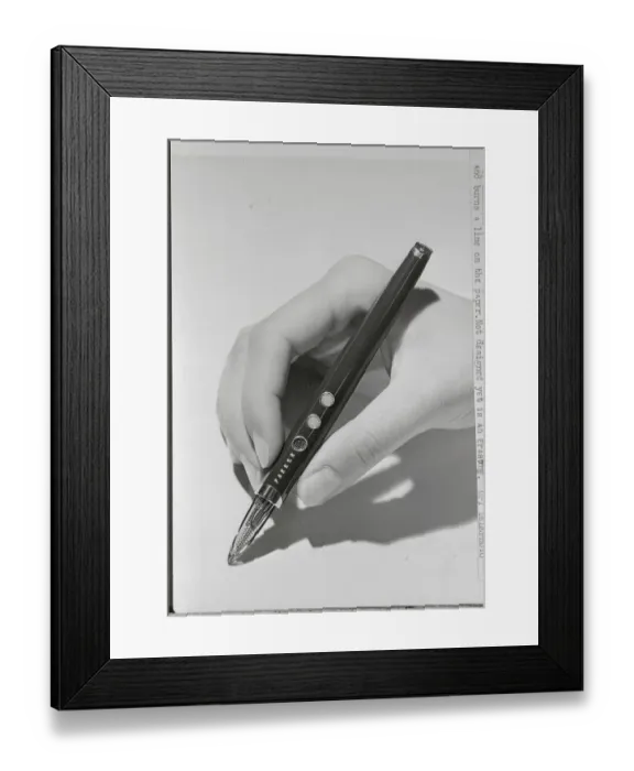 Framed Print : Hand Displaying the Conceptual Atomic Pen Framed Print : Hand Displaying the Conceptual Atomic Pen