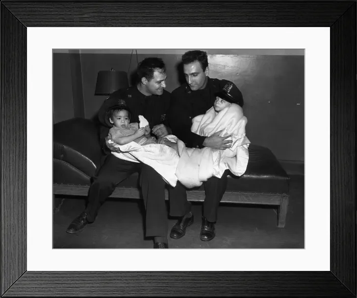 Framed Print : Two Police Officers with Rescued Youngsters Framed Print : Two Police Officers with Rescued Youngsters