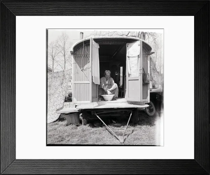 Framed Print : Gypsy Woman Bathes in Wagon Doorway Framed Print : Gypsy Woman Bathes in Wagon Doorway