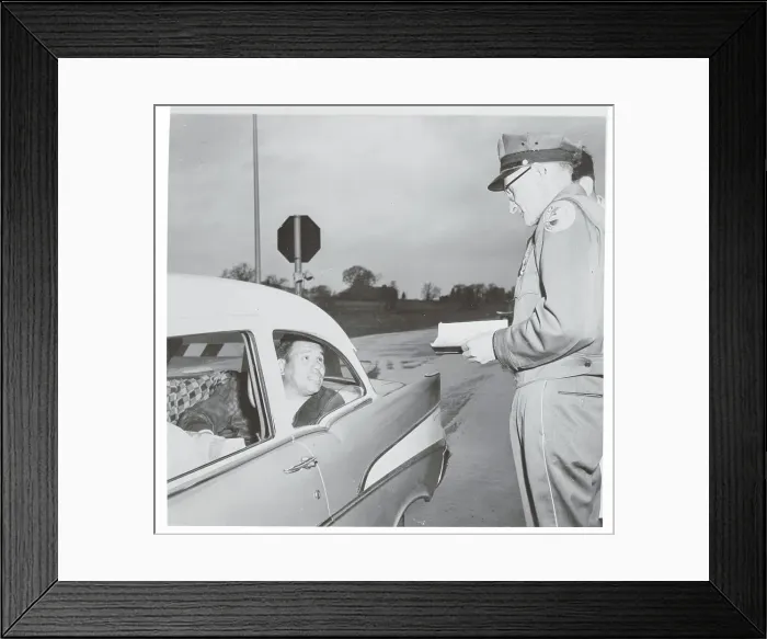 Framed Print : Toll Taker Conversing with Native American Activist in Automobile Framed Print : Toll Taker Conversing with Native American Activist in Automobile