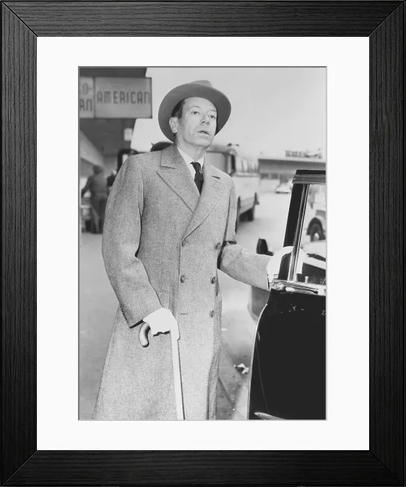 Framed Print : Cole Porter Grasping Onto Cane and Car Framed Print : Cole Porter Grasping Onto Cane and Car