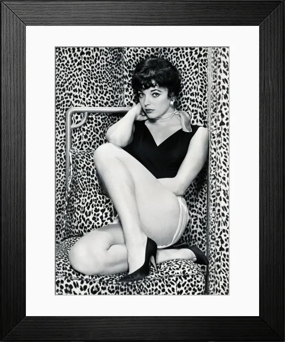 Framed Print : Joan Collins Posing Against Leopard Skin Framed Print : Joan Collins Posing Against Leopard Skin