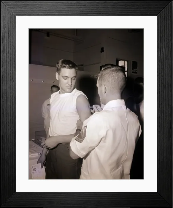 Framed Print : Elvis Presley Given Series Of Shots Framed Print : Elvis Presley Given Series Of Shots