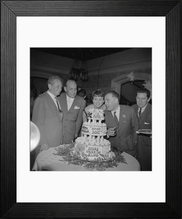 Framed Print : Party Hostess Sophia Loren Looks Over Cake Framed Print : Party Hostess Sophia Loren Looks Over Cake