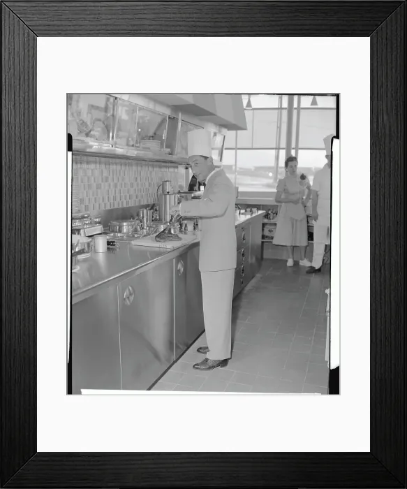 Framed Print : Eddie Arcaro Wearing Chef Hat While Cooking Framed Print : Eddie Arcaro Wearing Chef Hat While Cooking