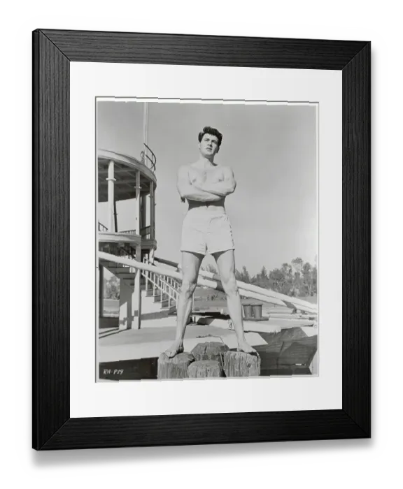 Framed Print : Rock Hudson Posing in Swimming Trunks Framed Print : Rock Hudson Posing in Swimming Trunks