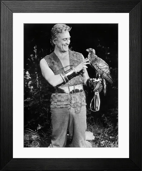 Framed Print : Kirk Douglas Holding a Falcon Framed Print : Kirk Douglas Holding a Falcon