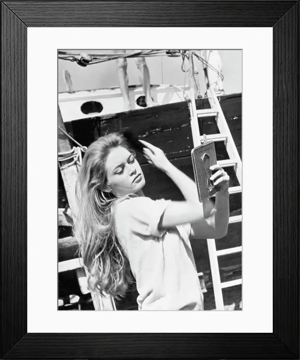 Framed Print : French Actress Brigitte Bardot Fixing Hair in Mirror Framed Print : French Actress Brigitte Bardot Fixing Hair in Mirror