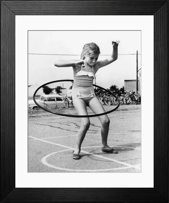 Framed Print : Girl Twirling Hula Hoop Framed Print : Girl Twirling Hula Hoop