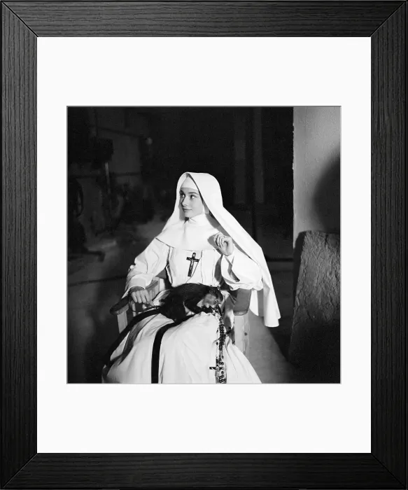 Framed Print : Audrey Hepburn with a Monkey in The Nun's Story