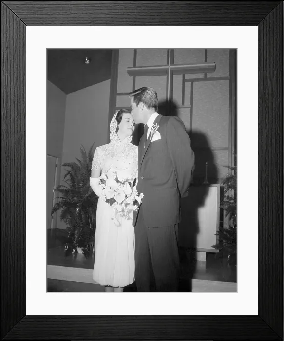 Framed Print : Actor Robert Wagner Kissing His New Wife Natalie Wood
