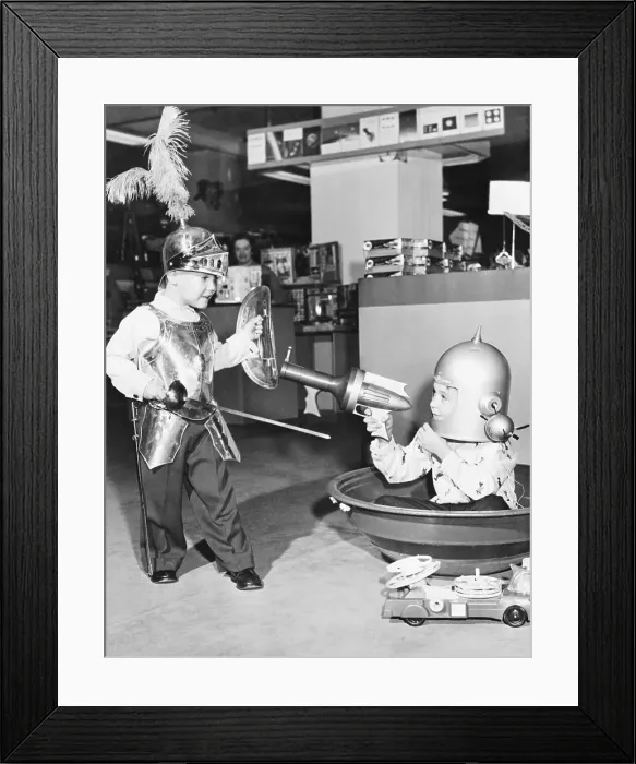 Framed Print : Young Brothers Playing with Various Era Toys Framed Print : Young Brothers Playing with Various Era Toys