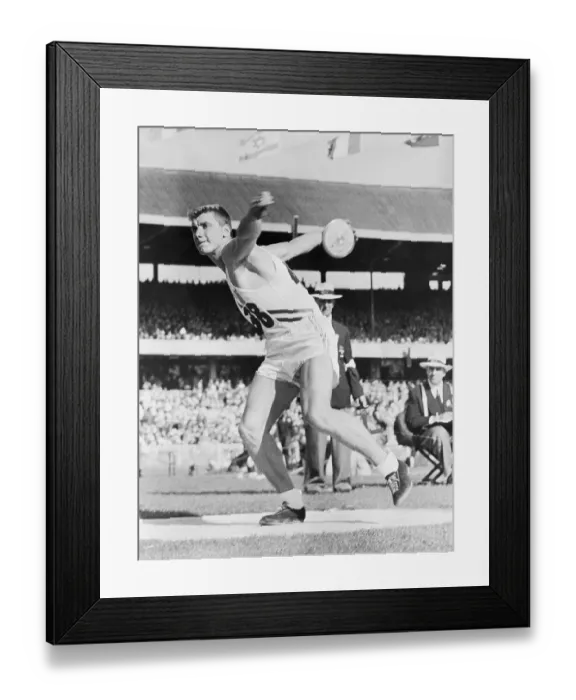Framed Print : Al Oerter Breaks Olympic Record