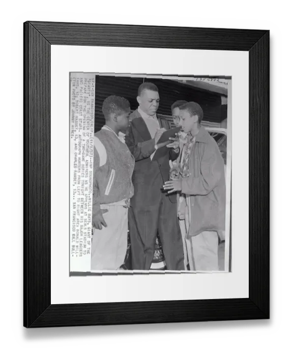 Framed Print : Willie Mays Signing an Autograph for Group of Fans Framed Print : Willie Mays Signing an Autograph for Group of Fans