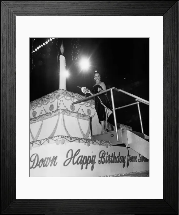 Framed Print : Elizabeth Taylor Cutting Giant Birthday Cake Framed Print : Elizabeth Taylor Cutting Giant Birthday Cake