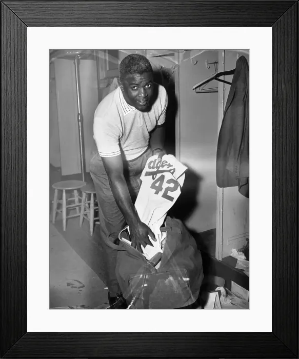 Framed Print : Jackie Robinson Putting Uniform into Bag Framed Print : Jackie Robinson Putting Uniform into Bag