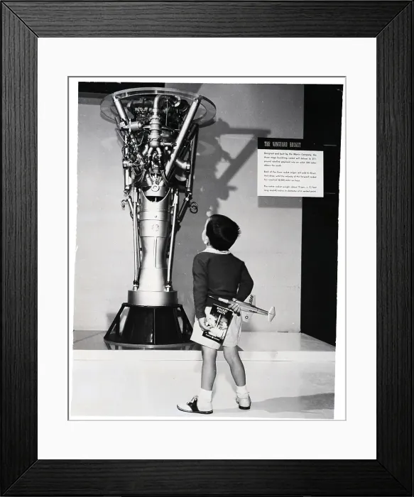 Framed Print : Child Admires The G.E. Rocket Engine Framed Print : Child Admires The G.E. Rocket Engine