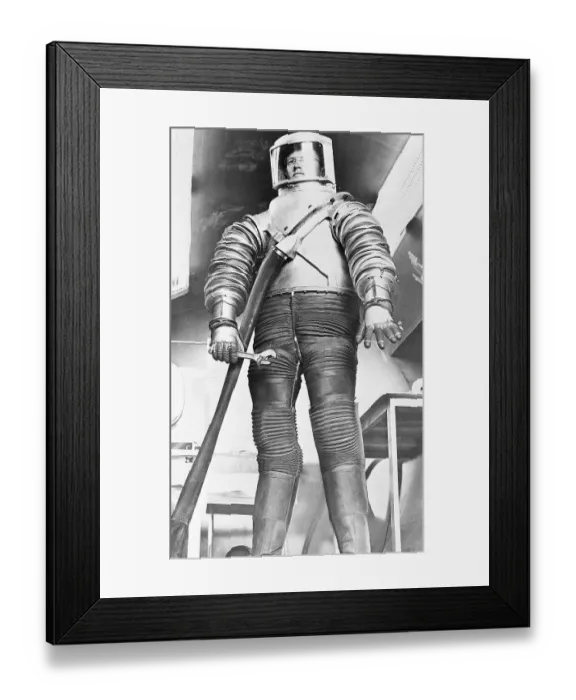 Framed Print : Man Poses in Test Space Suit Framed Print : Man Poses in Test Space Suit
