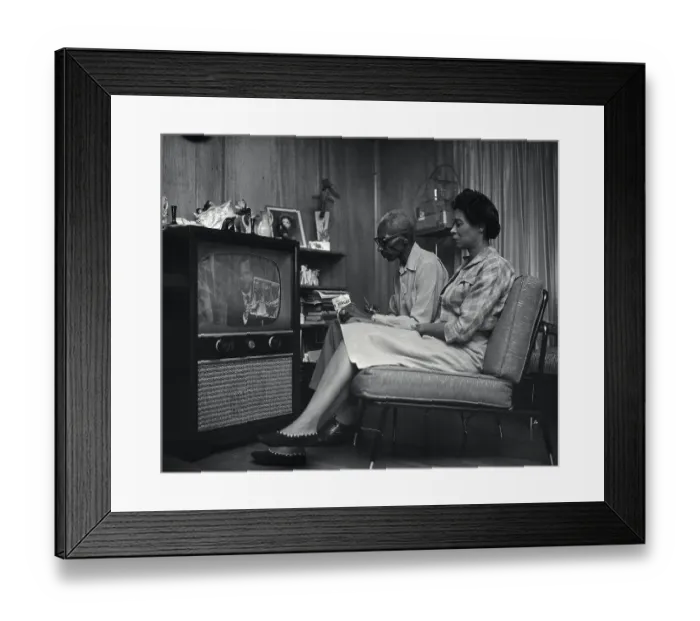 Framed Print : Elderly Black Couple Watching Faubus on TV Framed Print : Elderly Black Couple Watching Faubus on TV