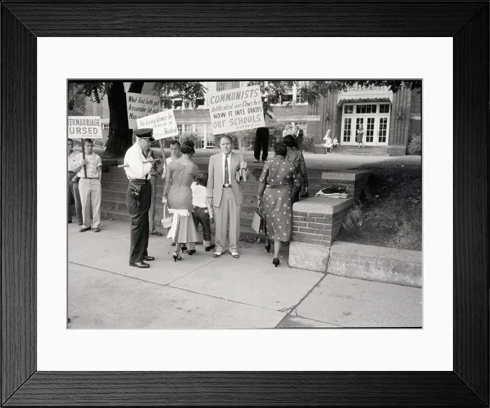 Framed Print : Mother and Child Walking Past Protestors Framed Print : Mother and Child Walking Past Protestors