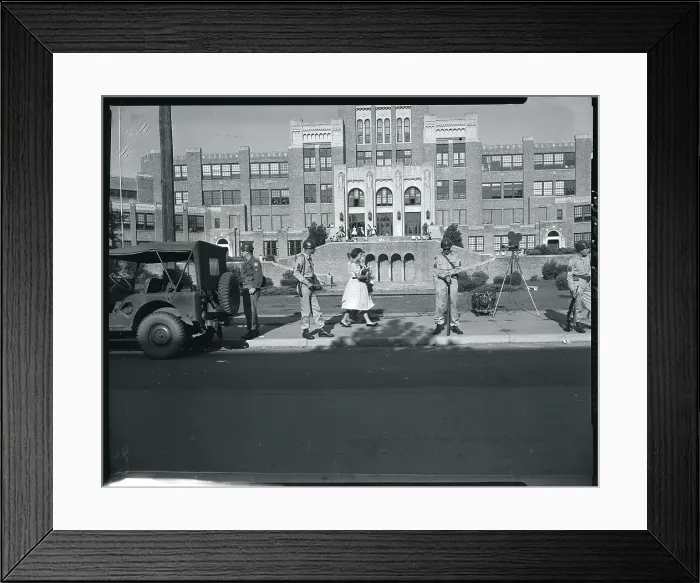 Framed Print : Students Pass Guards and Enter School Framed Print : Students Pass Guards and Enter School