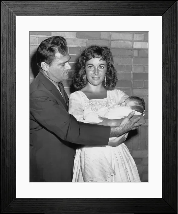 Framed Print : Elizabeth Taylor and Mike Todd Bringing Daughter Home from Hospital Framed Print : Elizabeth Taylor and Mike Todd Bringing Daughter Home from Hospital