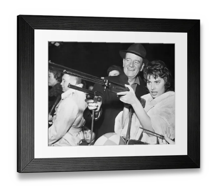 Framed Print : John Wayne and Sophia Loren Gun Play Framed Print : John Wayne and Sophia Loren Gun Play