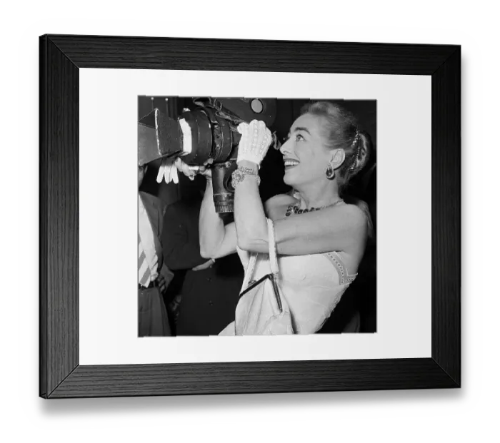 Framed Print : Joan Crawford Jokingly Handling a Camera