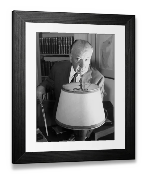 Framed Print : Alfred Hitchcock Holding a Letter Opener Framed Print : Alfred Hitchcock Holding a Letter Opener