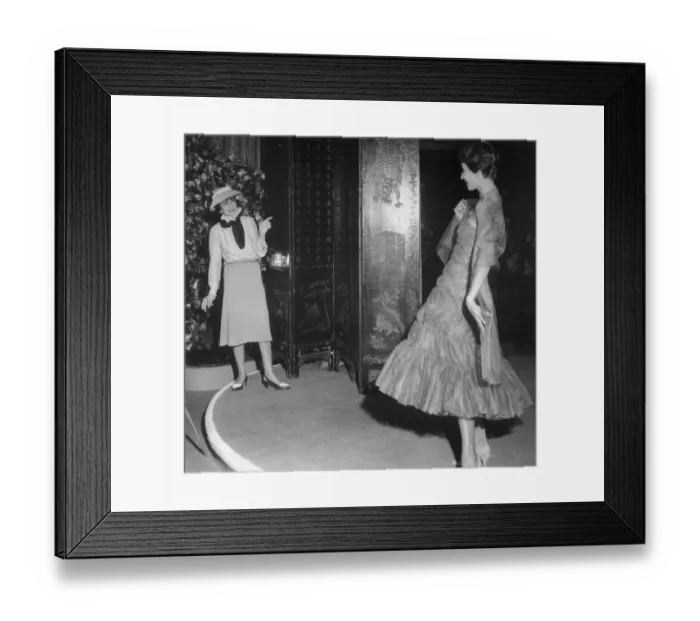 Framed Print : Coco Chanel Shows Newly-Designed Dress Framed Print : Coco Chanel Shows Newly-Designed Dress