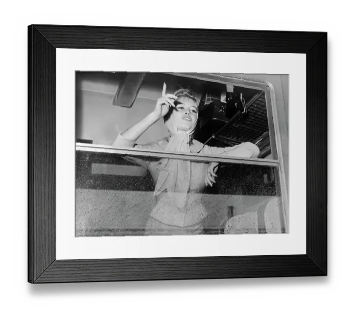 Framed Print : Brigitte Bardot Waving Goodbye from Window Framed Print : Brigitte Bardot Waving Goodbye from Window