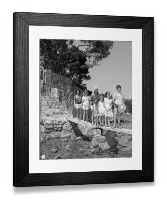 Framed Print : Charles Chaplin Standing with His Family Framed Print : Charles Chaplin Standing with His Family