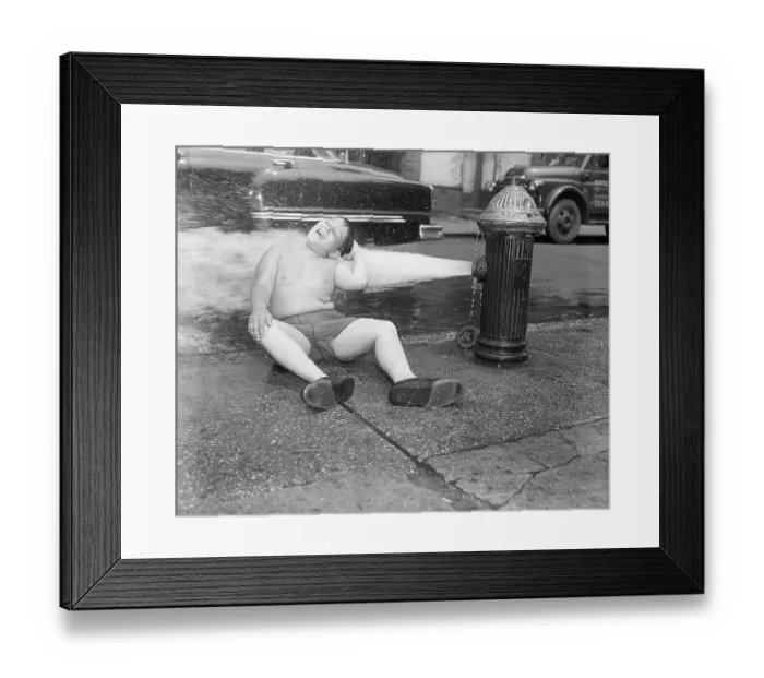 Framed Print : Boy Sits on Sidewalk in Fire Hydrant Framed Print : Boy Sits on Sidewalk in Fire Hydrant