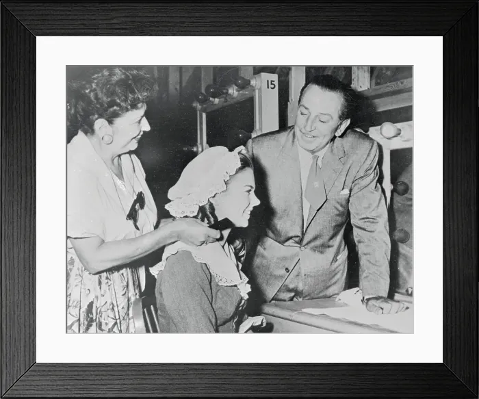 Framed Print : Walt Disney Observing His Daughter in Makeup Session Framed Print : Walt Disney Observing His Daughter in Makeup Session