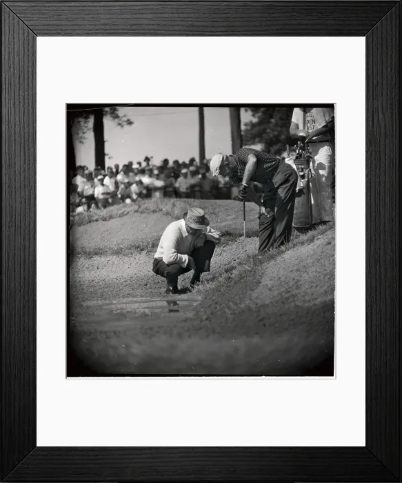 Framed Print : Sam Snead Examining Golf Ball Embedded in Course