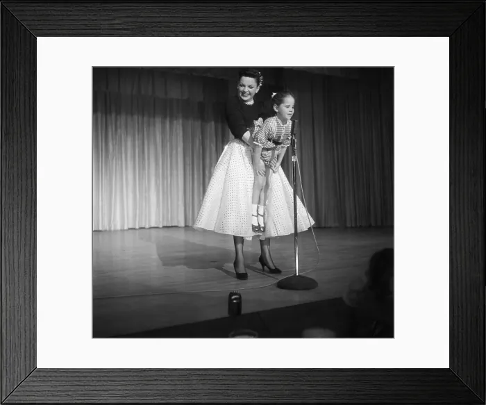 Framed Print : Judy Garland Holding her Daughter Framed Print : Judy Garland Holding her Daughter
