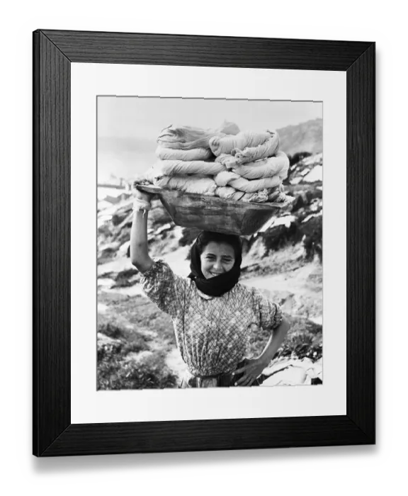 Framed Print : Woman Carrying Laundry On Her Head Framed Print : Woman Carrying Laundry On Her Head