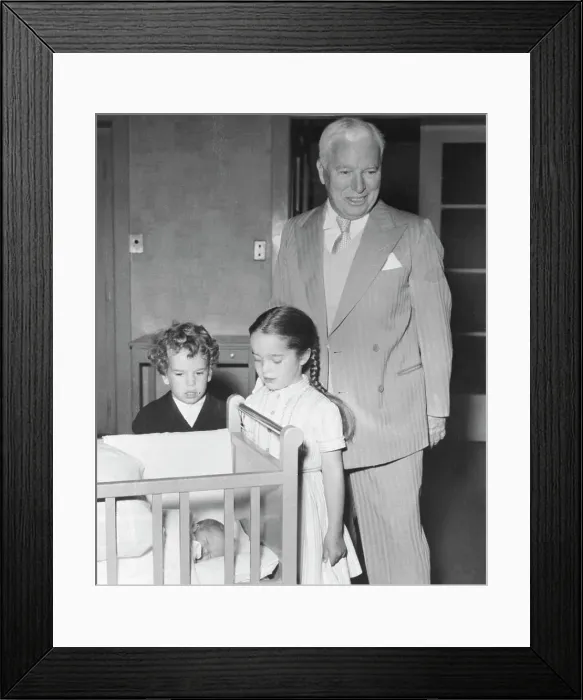 Framed Print : Chaplin Admiring Newborn Framed Print : Chaplin Admiring Newborn