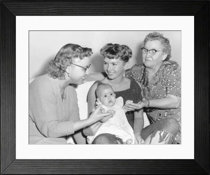 Framed Print : Debbie Reynolds Holding Daughter Framed Print : Debbie Reynolds Holding Daughter