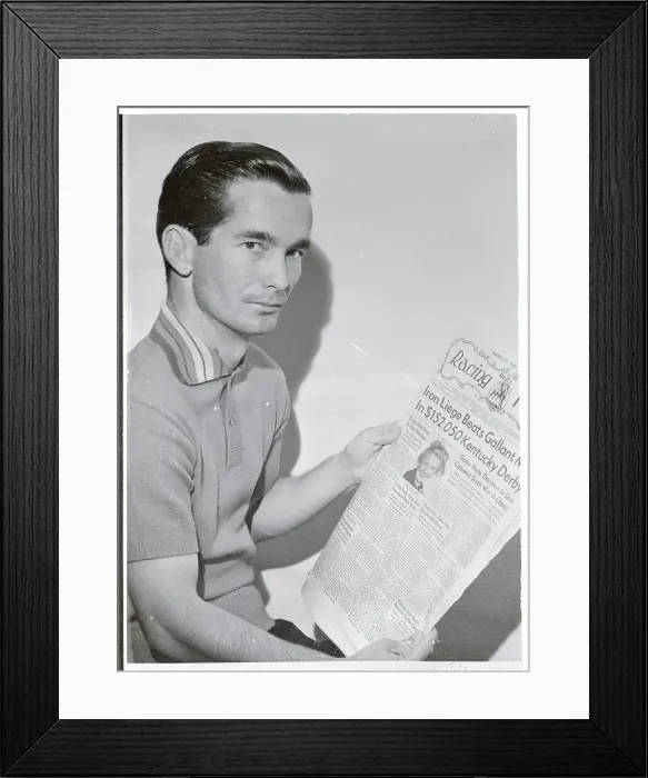 Framed Print : Willie Shoemaker Reading Headline About His Mistake Framed Print : Willie Shoemaker Reading Headline About His Mistake