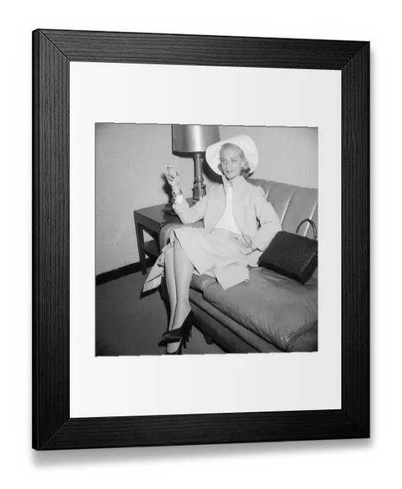 Framed Print : Lauren Bacall Smokes A Cigaret Framed Print : Lauren Bacall Smokes A Cigaret