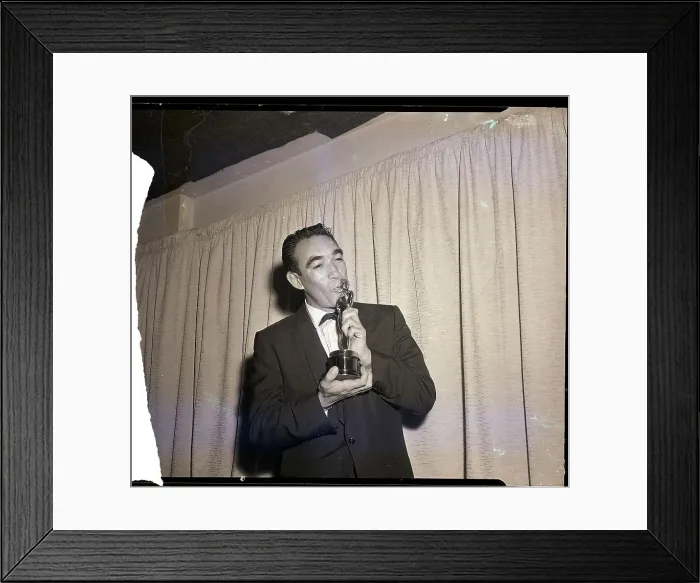 Framed Print : Anthony Quinn Kisses His Oscar Framed Print : Anthony Quinn Kisses His Oscar