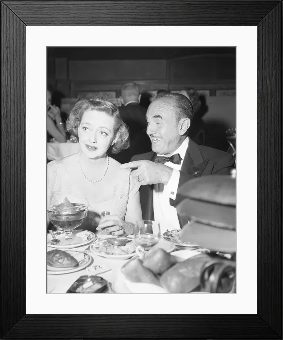 Framed Print : Bette Davis at Table with Jack Warner Framed Print : Bette Davis at Table with Jack Warner