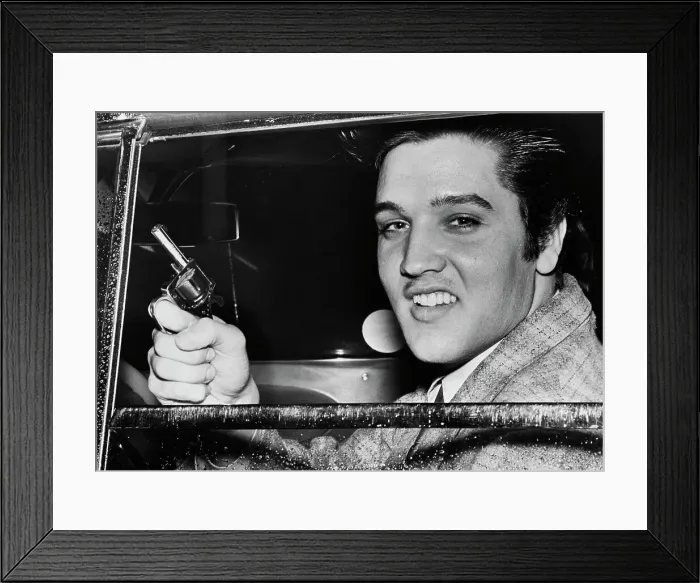 Framed Print : Elvis Presley Holds Toy Pistol Framed Print : Elvis Presley Holds Toy Pistol